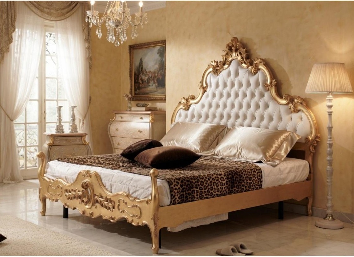 Gold-baroque-ornate-luxury-double-bed-with-white-button-tufted-headboard-open-carved-pierced-footboard-lifestyle-view-luxury-group-international
